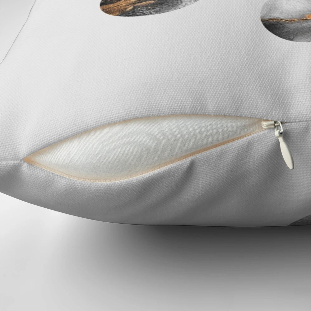 Soft, plush moon-shaped pillow with a crescent moon design, perfect for a space-themed bedroom or living room.