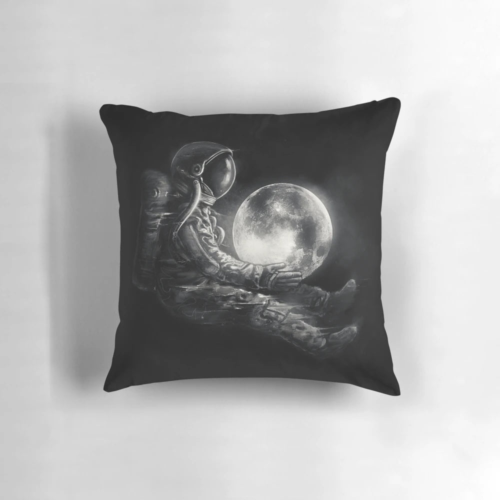 Whimsical space-themed pillow with abstract moon design