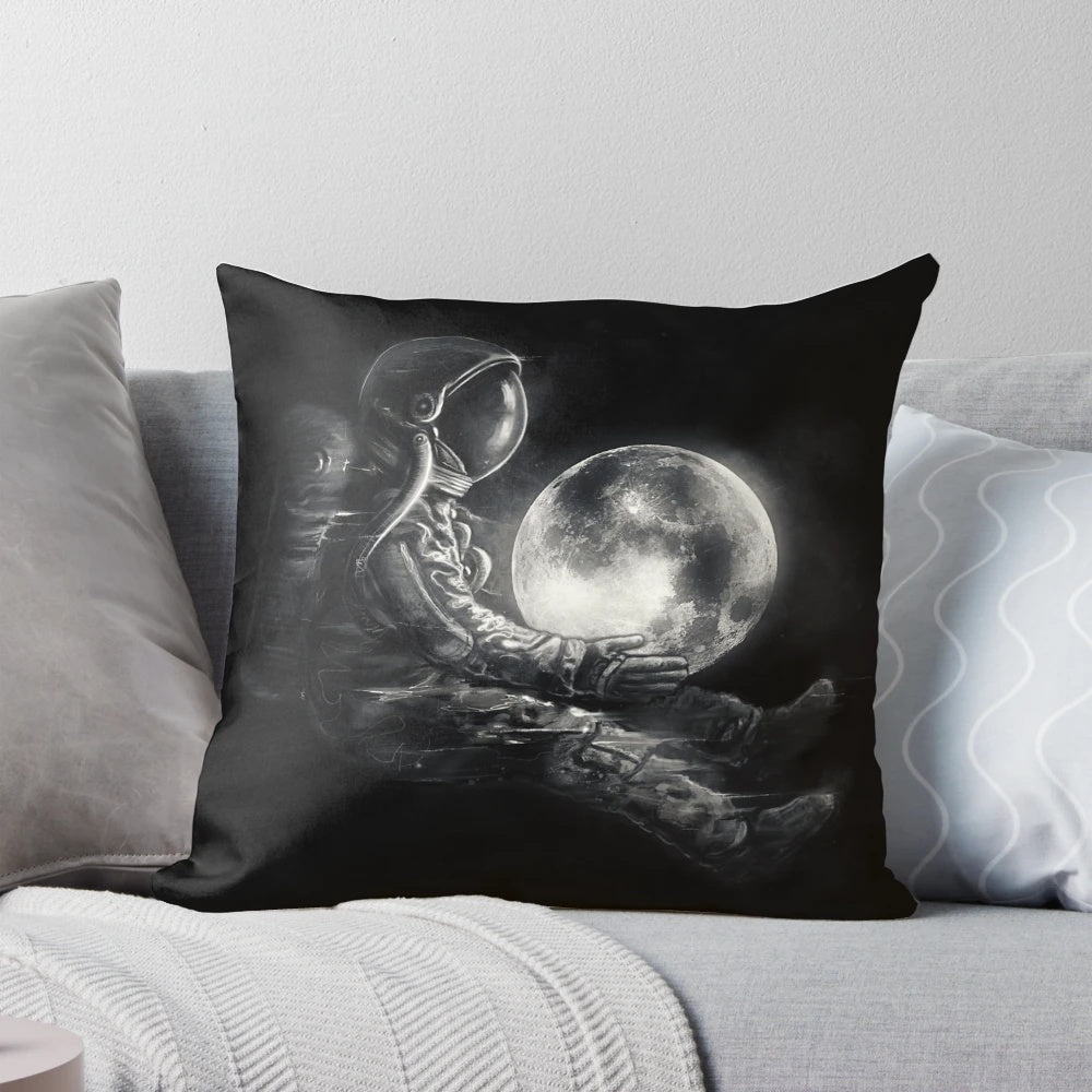 Whimsical space-themed pillow with abstract moon design