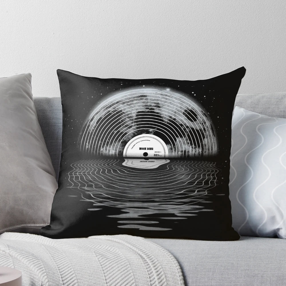 A decorative pillow featuring a moon and night sky design, perfect for a space-themed or retro-inspired bedroom.