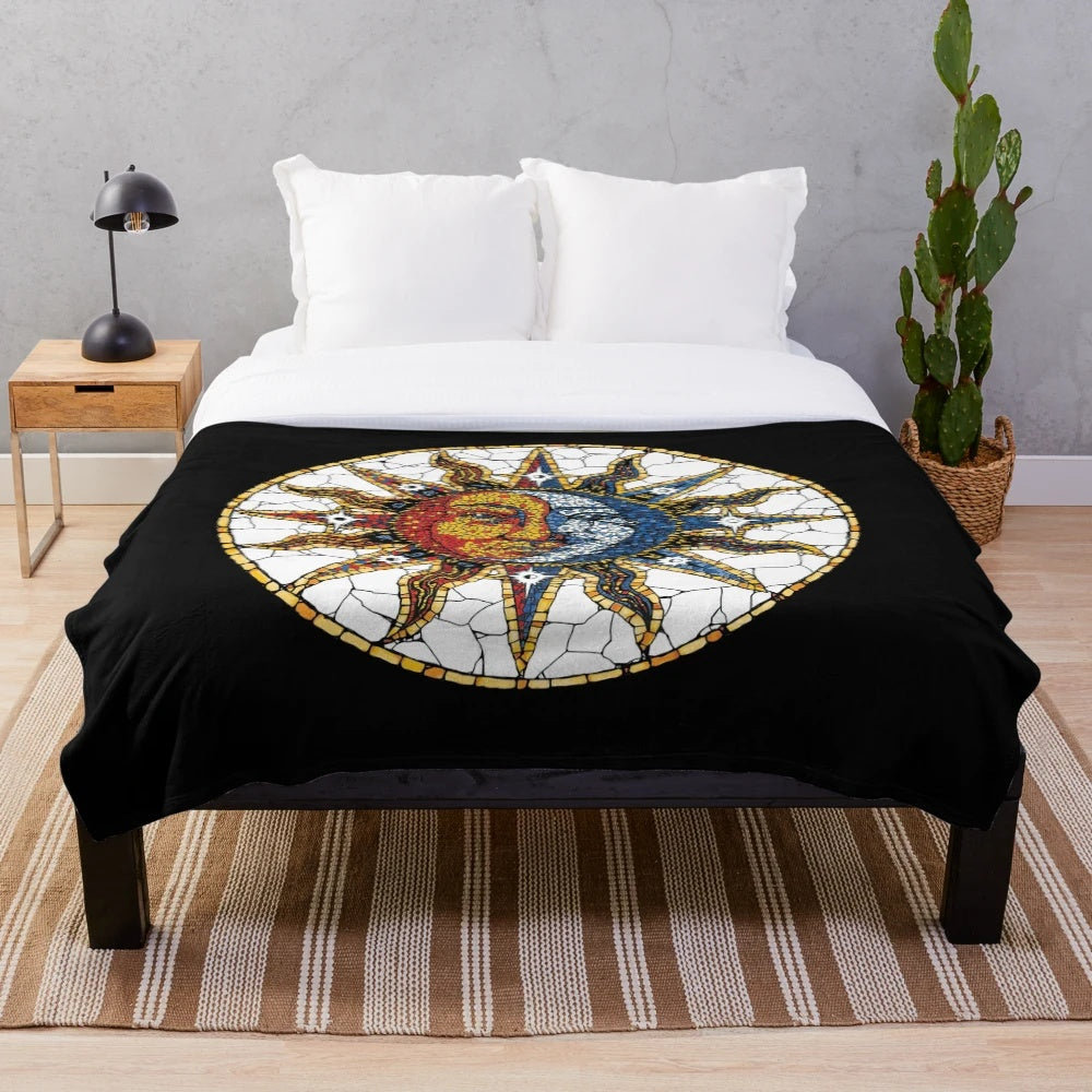 Colorful celestial plush blanket with sun and moon mosaic pattern