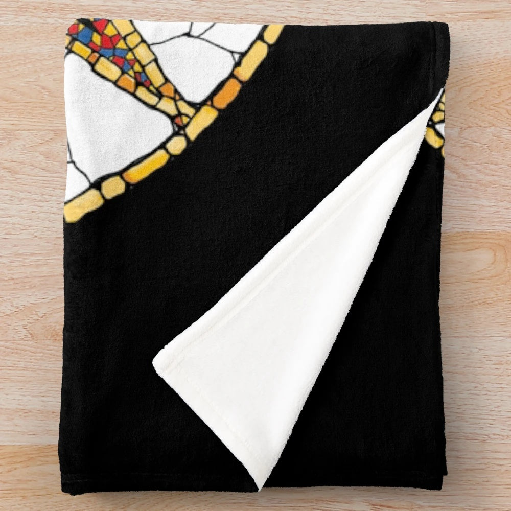 Colorful celestial plush blanket with sun and moon mosaic pattern