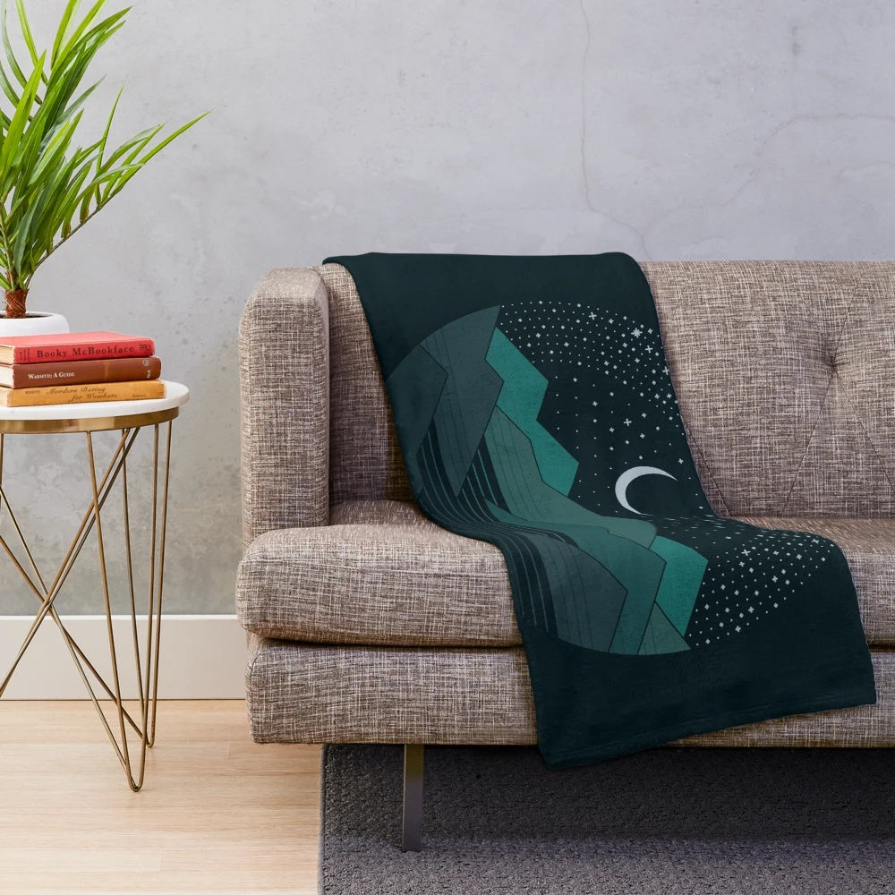 Plush blanket with minimalist starry night and mountain landscape design