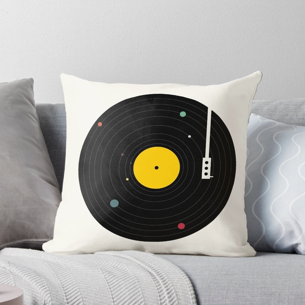 Celestial-themed throw pillow with a retro record player design