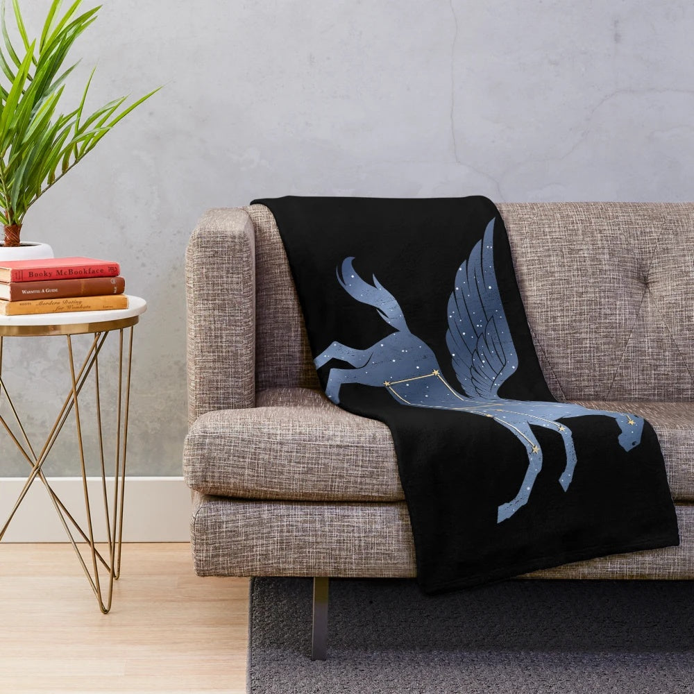 Pegasus-inspired plush blanket with celestial and mythical creature design