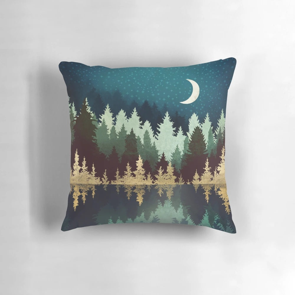 Stunning pillow with a serene forest landscape reflected in tranquil blue waters under a starry sky
