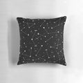 Black and white pillow with a celestial night sky pattern, featuring stars and a magical, witchy design.