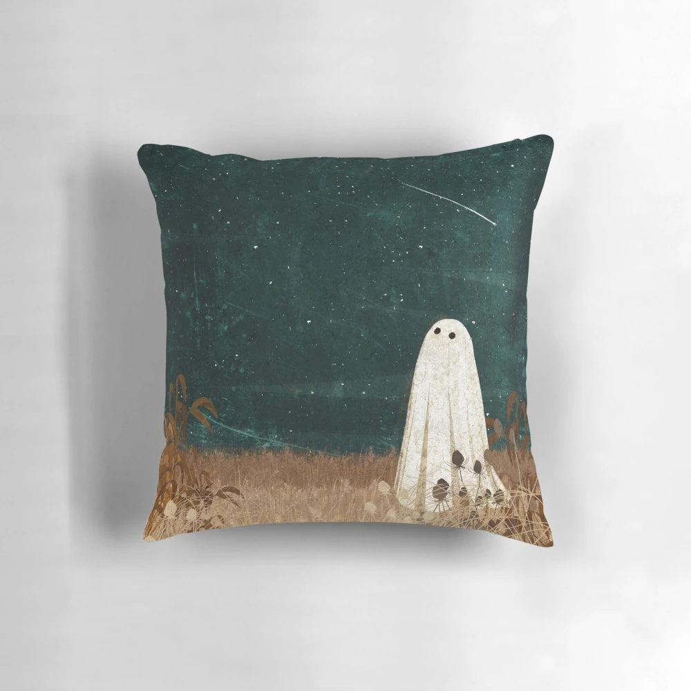 Pillow with a digital illustration of a night sky filled with shooting stars and meteors