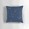 A navy blue pillow featuring a captivating night sky design with star constellations and the north star.
