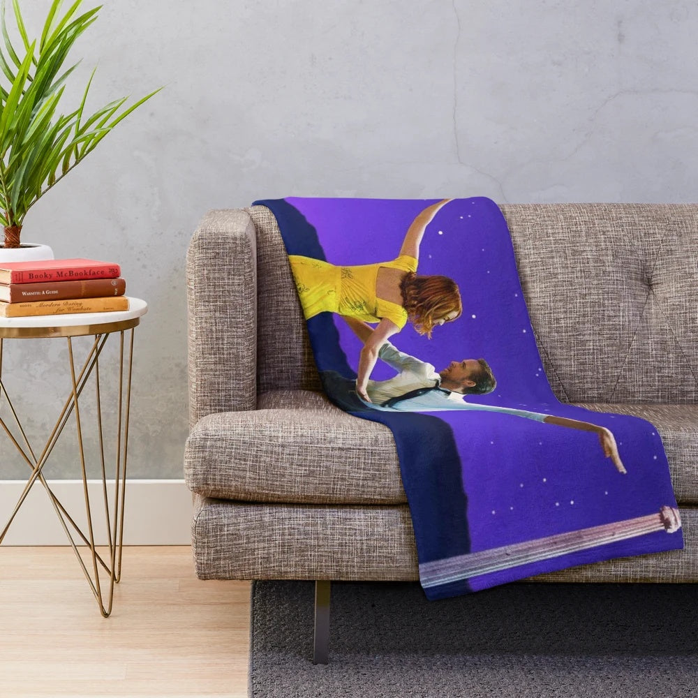 Plush blanket with a night sky and stars design