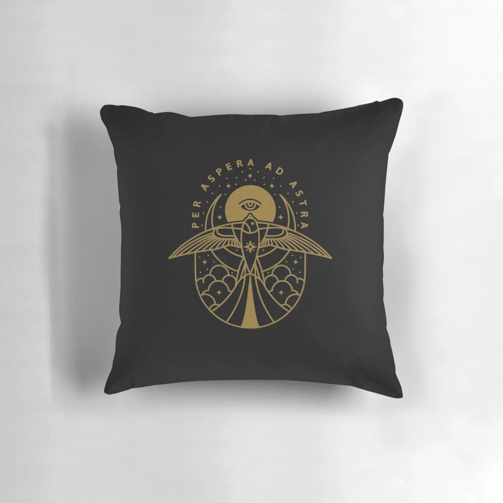 A decorative throw pillow featuring the Latin quote "Per Aspera Ad Astra" against a starry night sky backdrop.