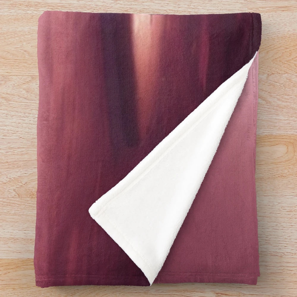 Plush blanket featuring a moon from another planet design, perfect for cinema and movie lovers