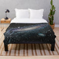 Cozy plush blanket featuring a starry night sky design