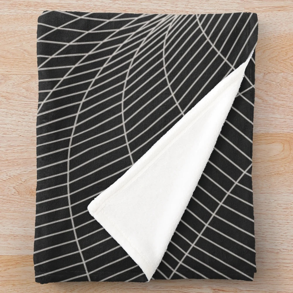 A plush, cozy blanket featuring a cosmic, sci-fi inspired design with elements like black holes, event horizons, and galaxies.