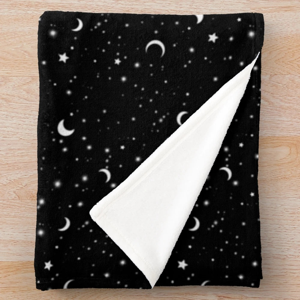 Soft and plush black galaxy/universe themed blanket with a cozy, celestial design