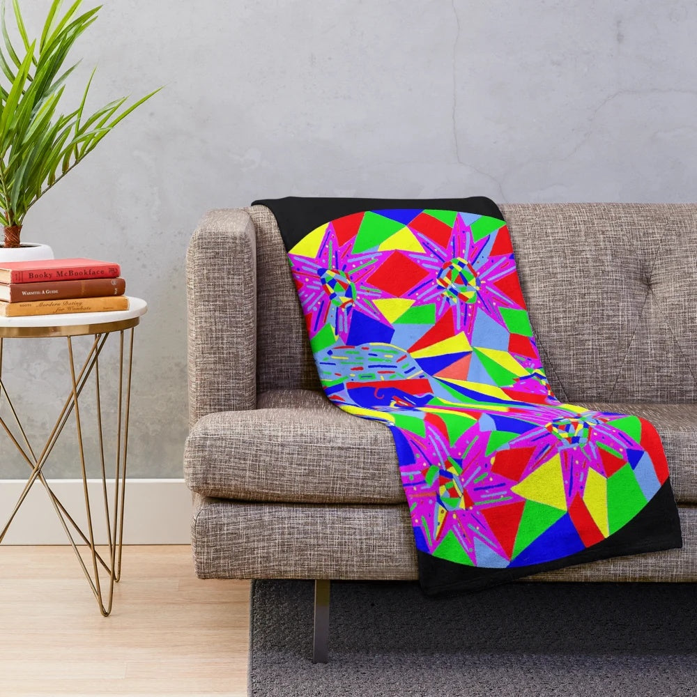 Plush blanket with cosmic and galactic patterns