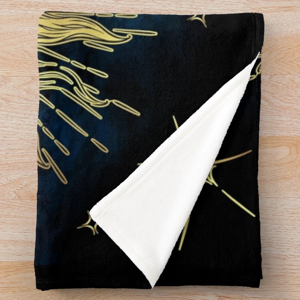 Cozy plush blanket with a celestial night sky design featuring the sun, moon, and stars