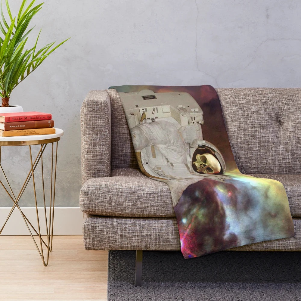 Plush blanket with a sci-fi, space-themed design featuring astronauts, planets, and a colorful galaxy