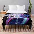 Colorful plush blanket featuring the princesses of the sun and moon from My Little Pony