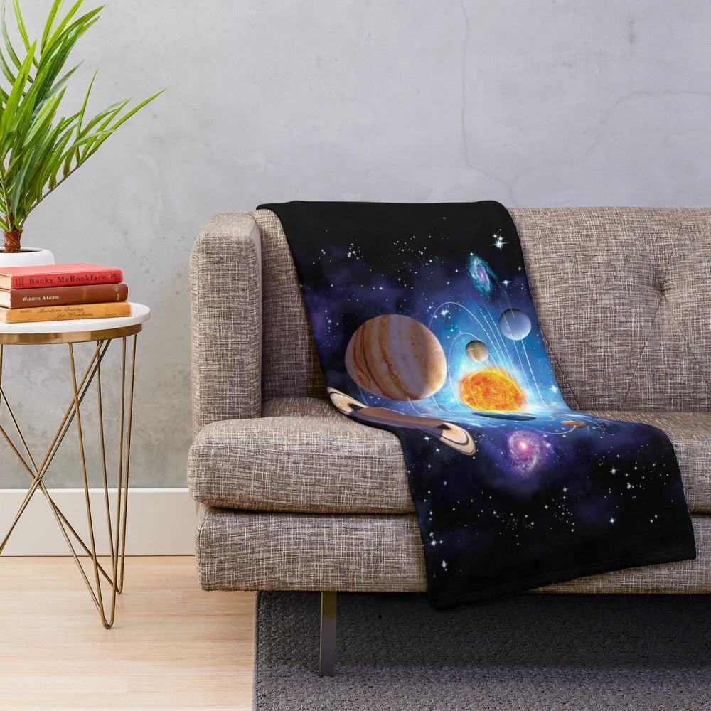 Solar system plush blanket featuring planets, stars, and galaxy design