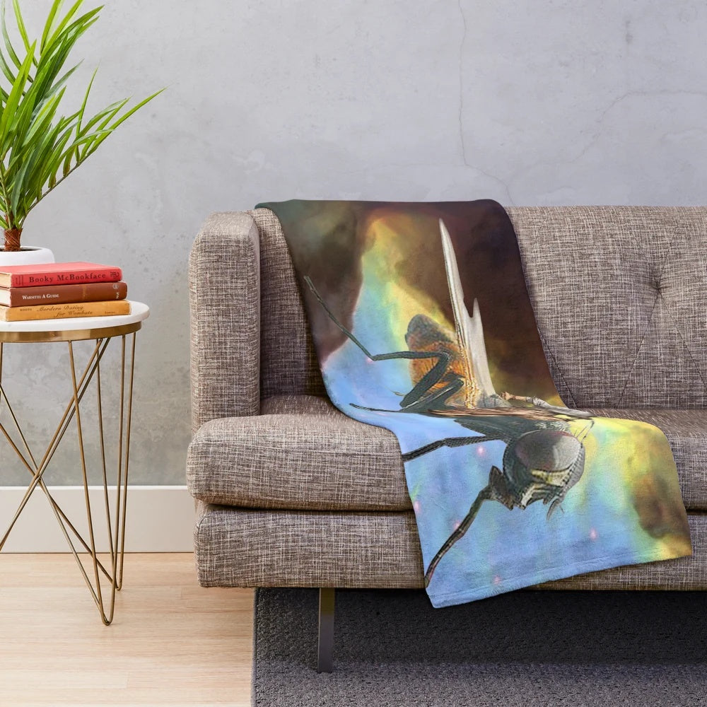 Plush blanket featuring a space cowboy design with cosmic and retro elements