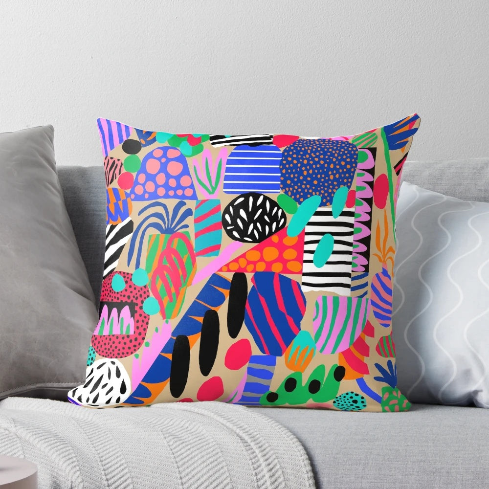 A plush, decorative pillow featuring a vibrant space garden design, perfect for adding a touch of cosmic style to any room.