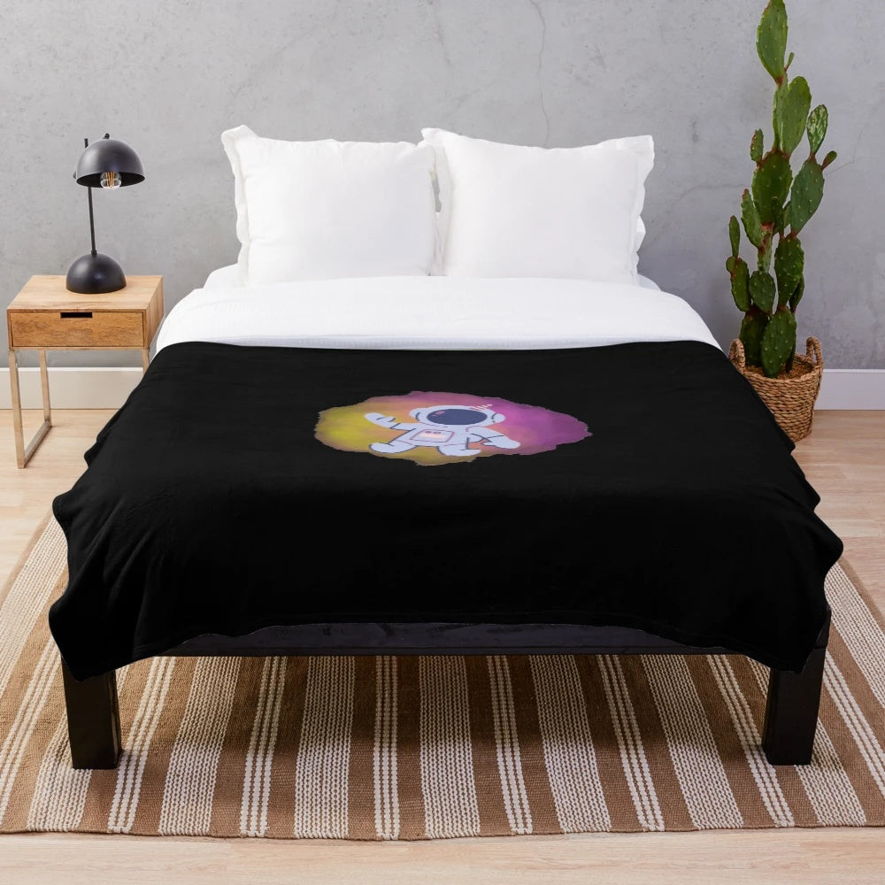 Space-themed plush blanket with galaxy, stars, and cosmic design