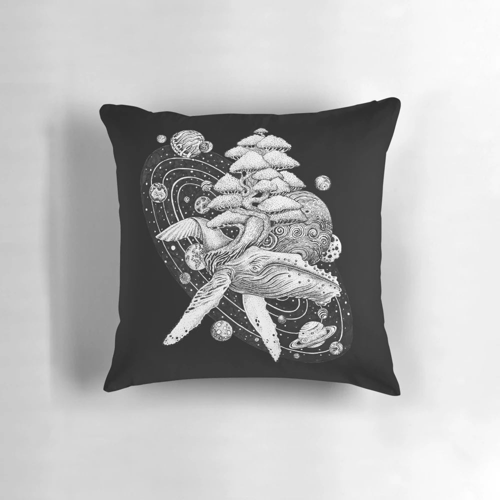 A vibrant space-themed pillow featuring a whale design with planets, moons, and galaxies.