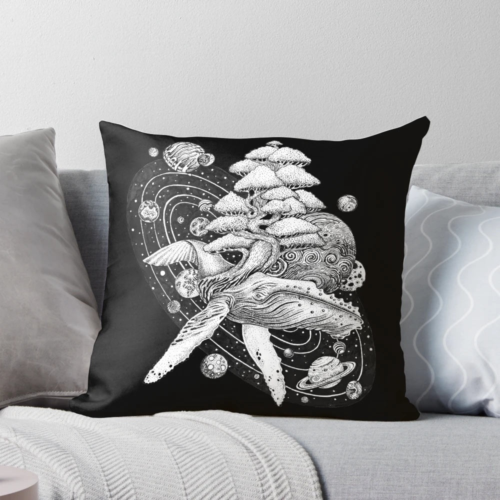 A vibrant space-themed pillow featuring a whale design with planets, moons, and galaxies.