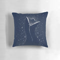A serene and artsy pillow featuring a spotted eagle ray swimming amongst the stars and galaxies of the cosmos.