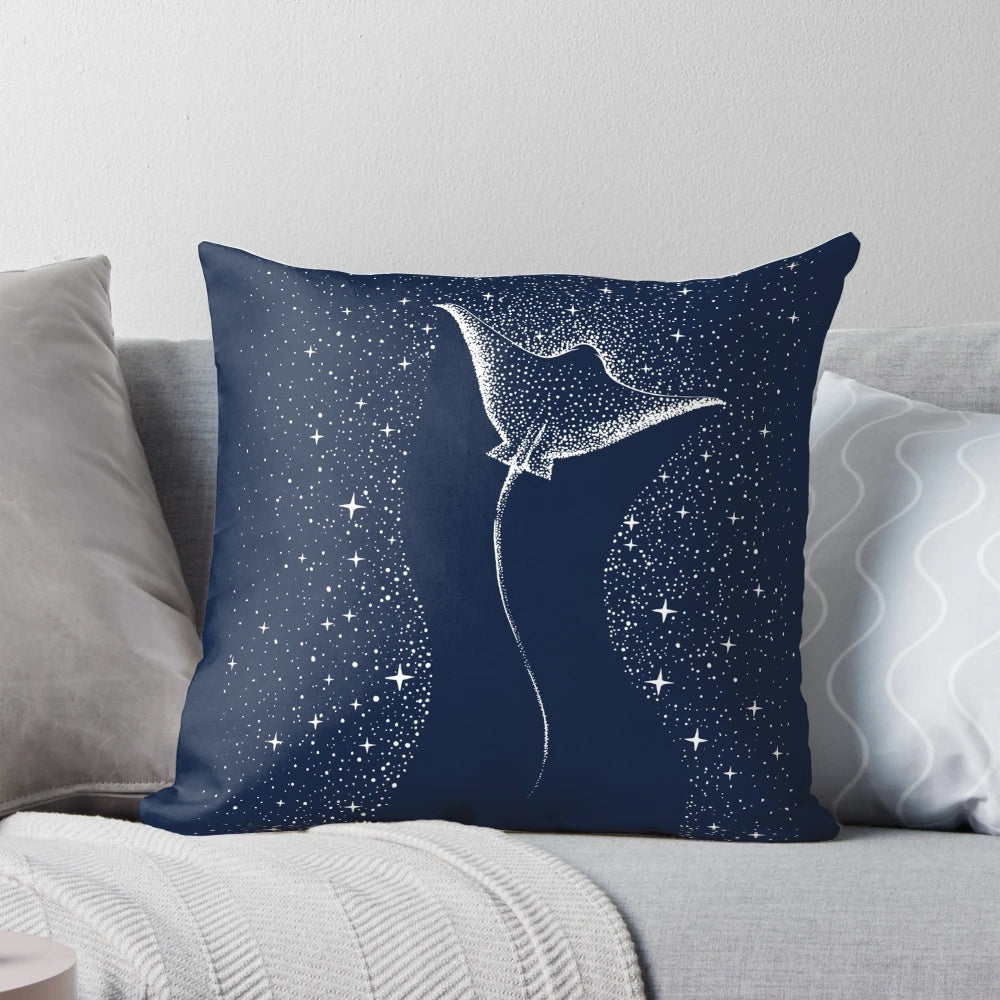 A serene and artsy pillow featuring a spotted eagle ray swimming amongst the stars and galaxies of the cosmos.