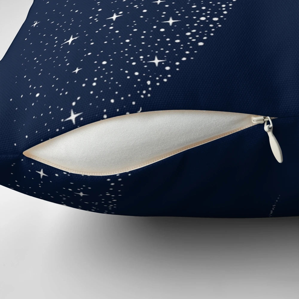 A serene and artsy pillow featuring a spotted eagle ray swimming amongst the stars and galaxies of the cosmos.