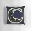 Celestial moon cat pillow featuring a crescent moon design for stretching and relaxation