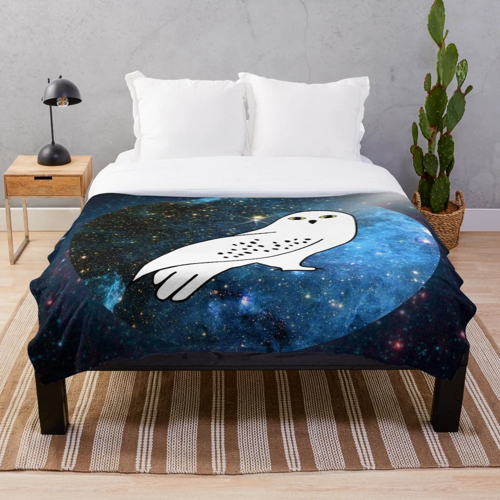 White owl plush blanket with galaxy, stars, and magical elements
