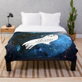 White owl plush blanket with galaxy, stars, and magical elements