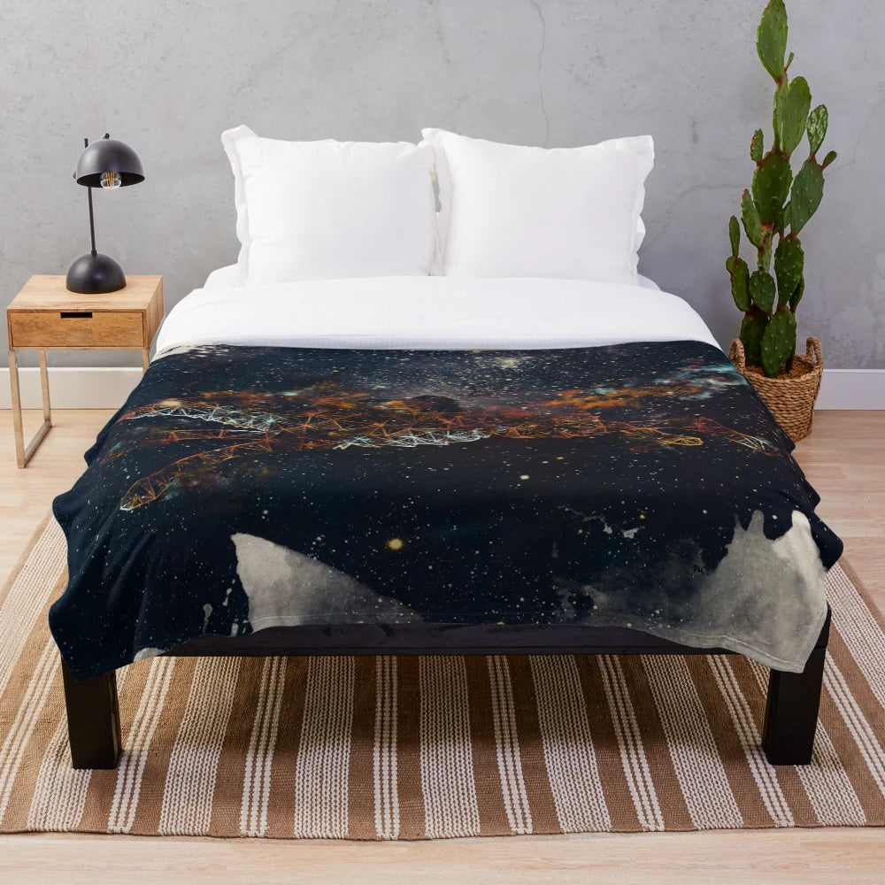Celestial wolf plush blanket featuring a galaxy-inspired design
