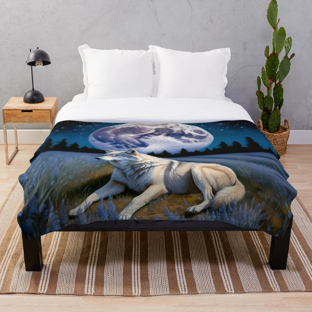 Cozy plush blanket featuring a majestic wolf under a starry night sky
