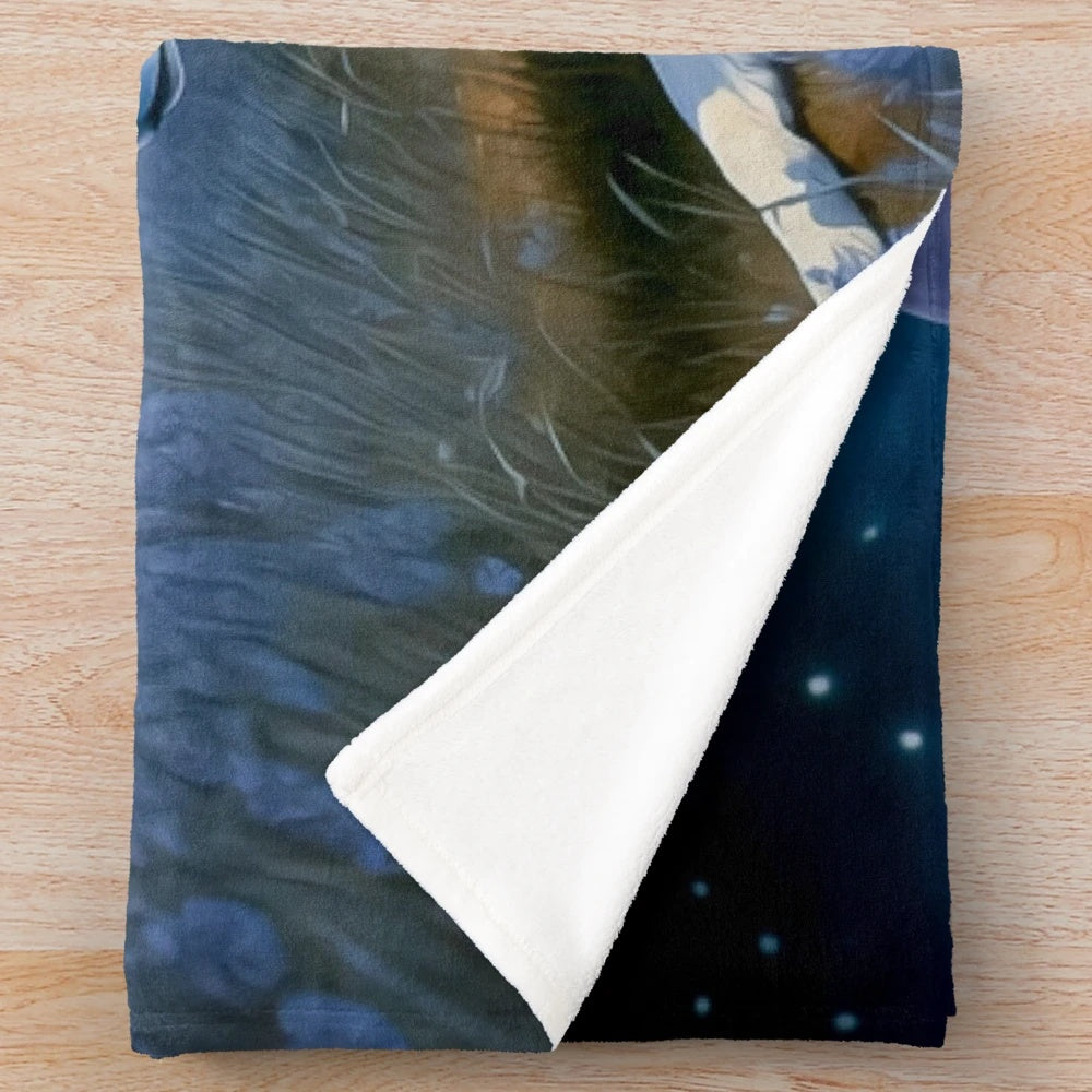 Cozy plush blanket featuring a majestic wolf under a starry night sky