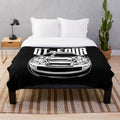 Plush blanket featuring a Celica GT-Four sports car design