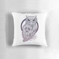 A decorative throw pillow featuring a Celtic-style owl design with intricate knotwork and a crescent moon.