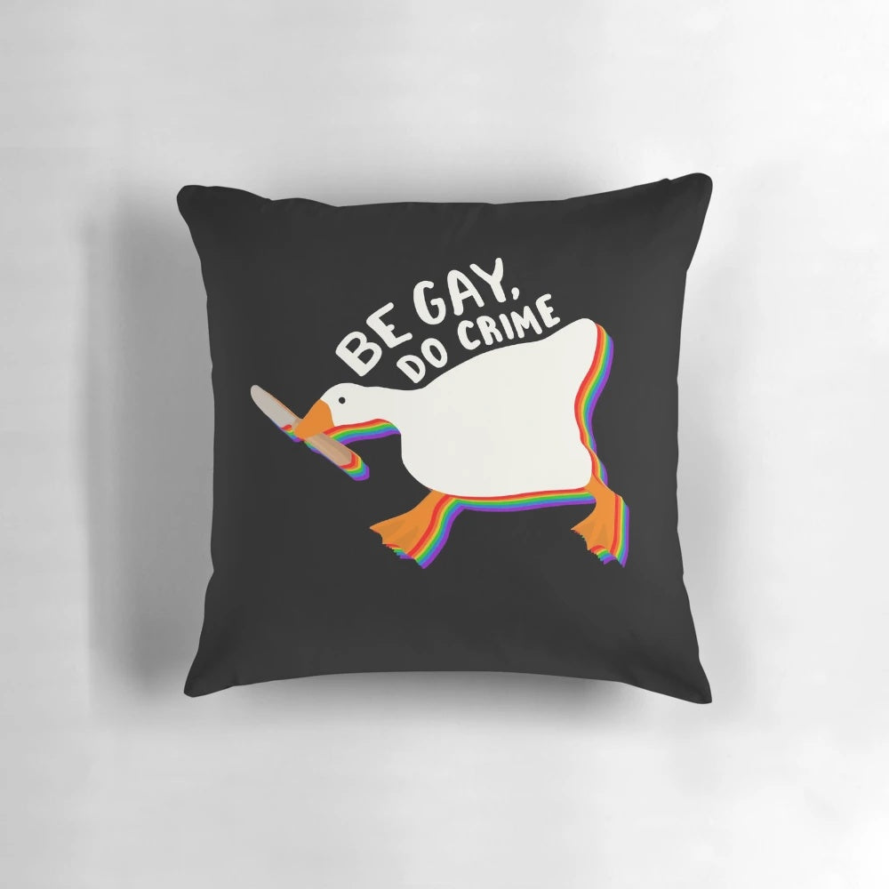 Chaotic goose design on a colorful LGBTQIA+ pride flag-inspired pillow
