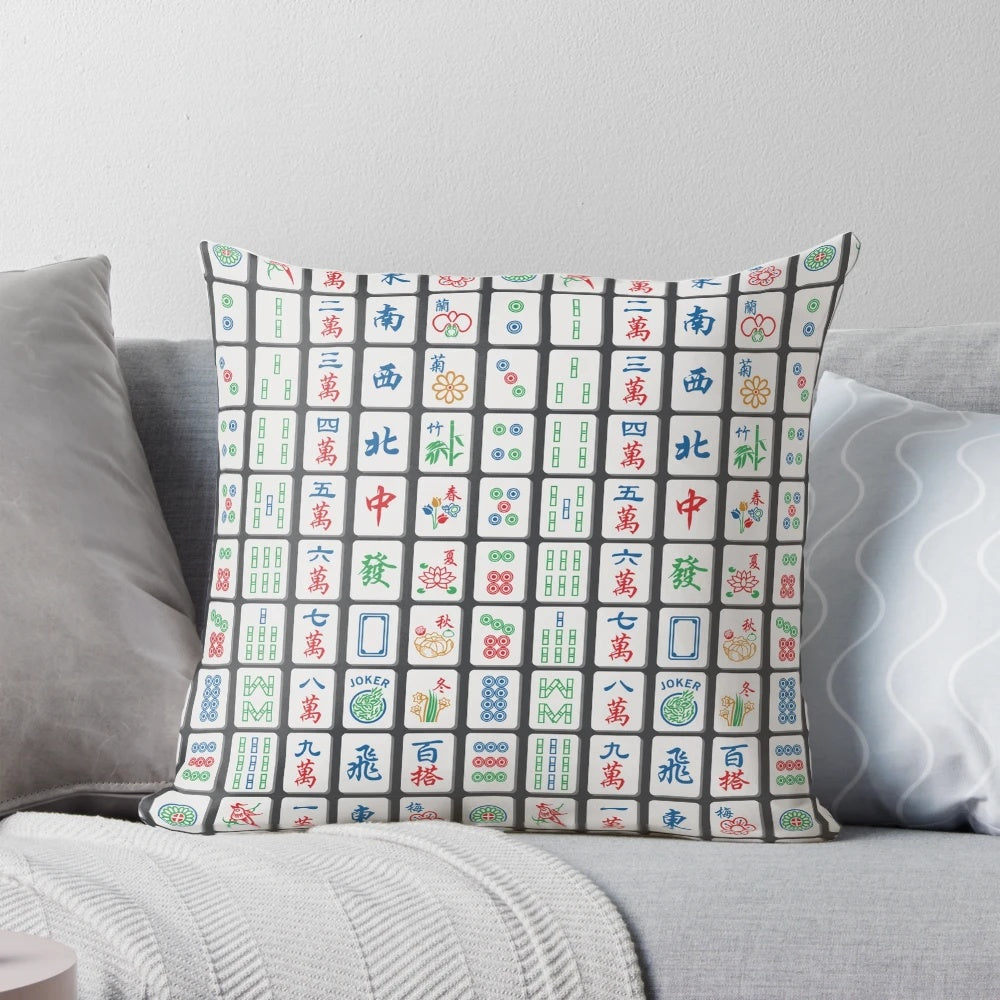 Charcoal-colored decorative throw pillow featuring a pattern of traditional mahjong tiles