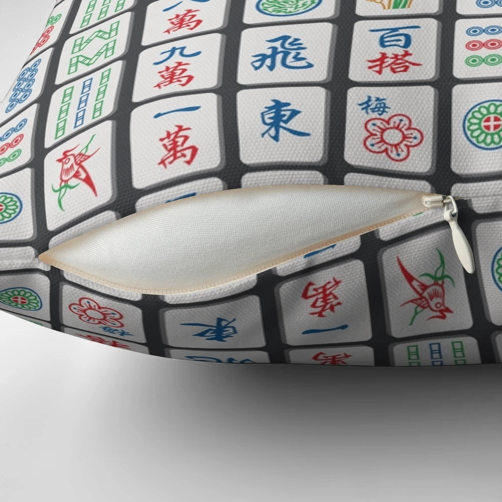 Charcoal-colored decorative throw pillow featuring a pattern of traditional mahjong tiles