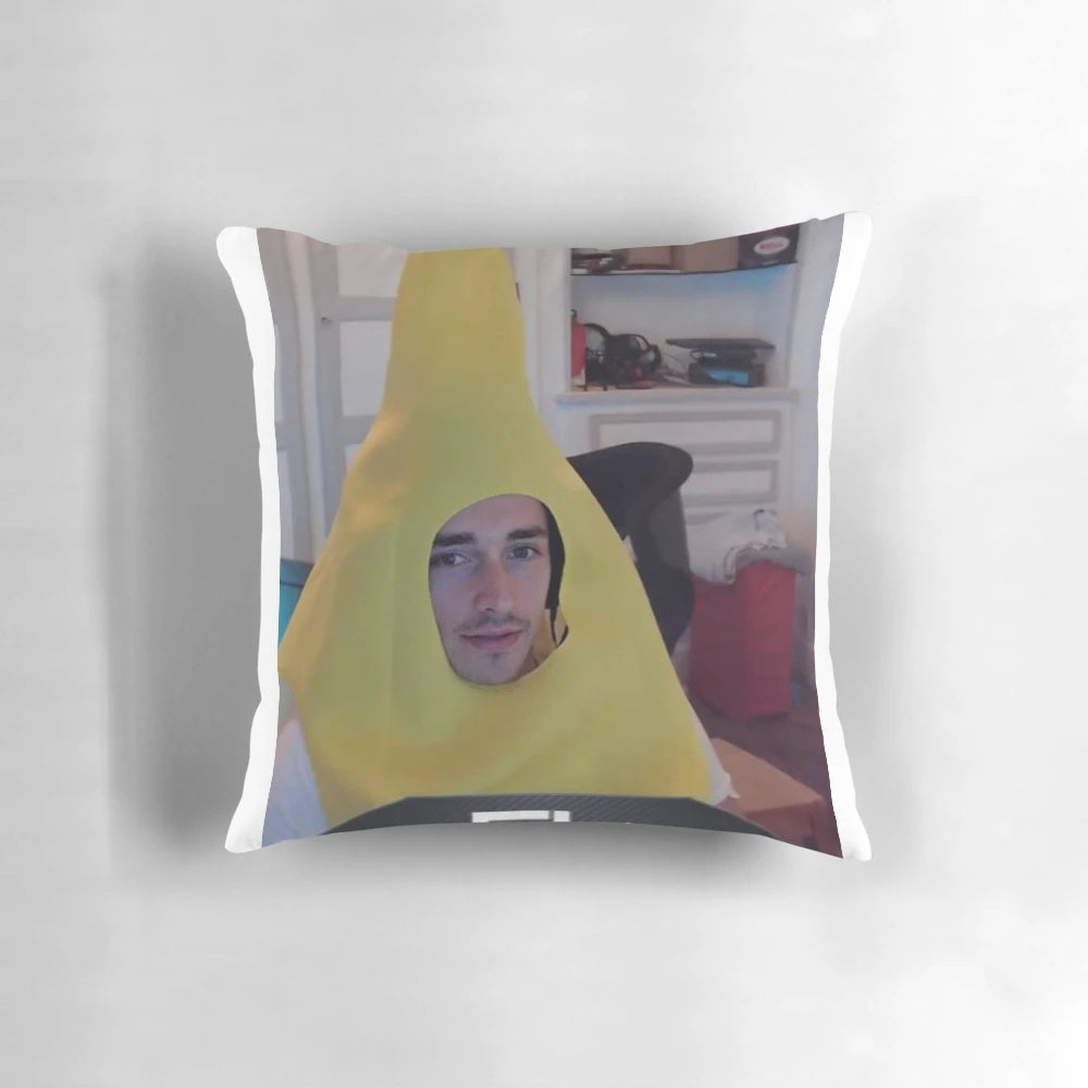 A plush pillow featuring a smiling Charles Leclerc, the Ferrari Formula 1 driver, holding a banana.