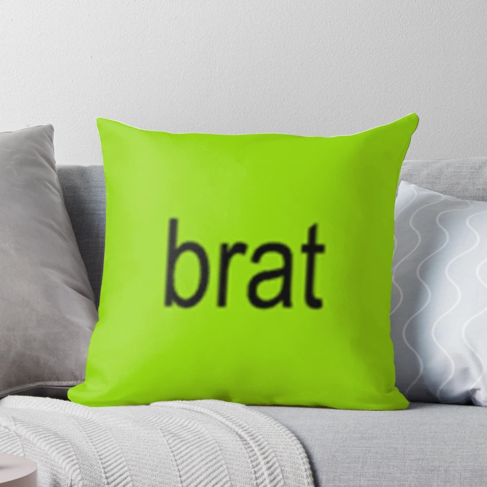 Charli XCX 'Brat' inspired aesthetic pillow with a vibrant green and pink design