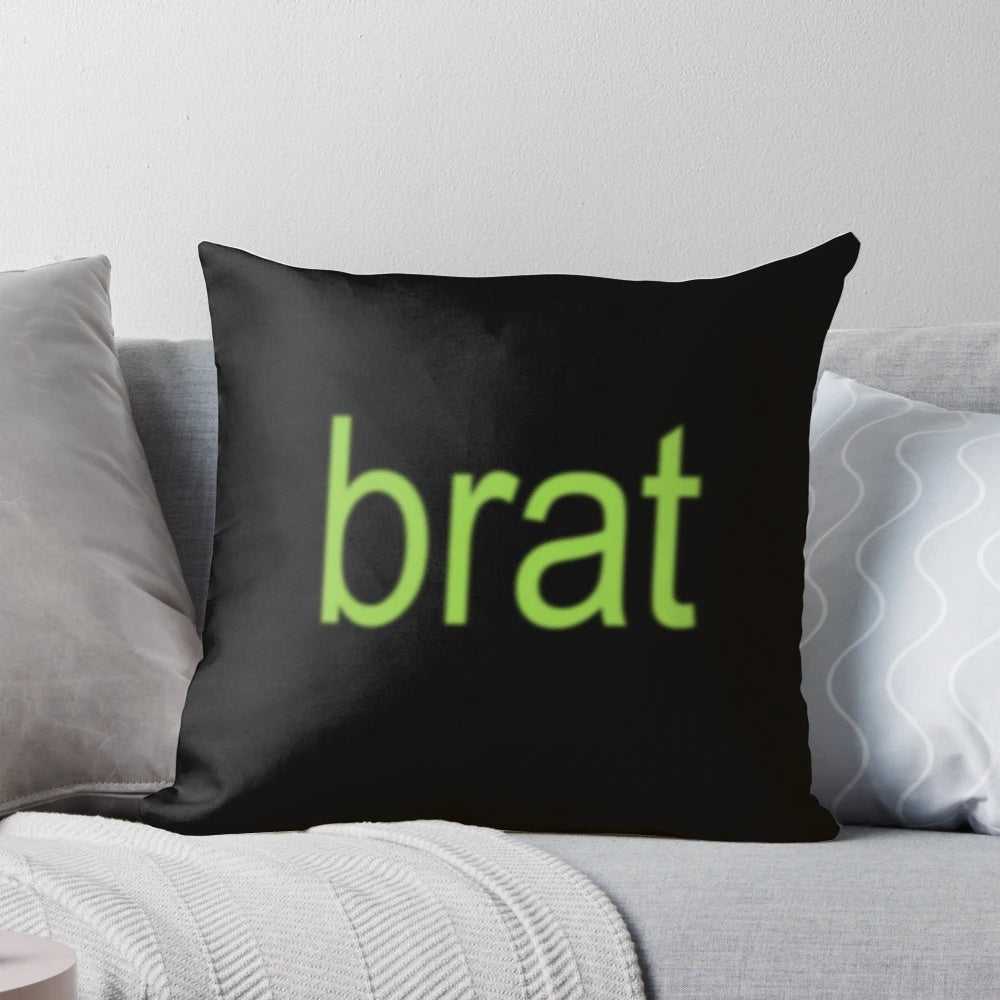 Green Pillow featuring the album cover art for Charli XCX's 'Brat