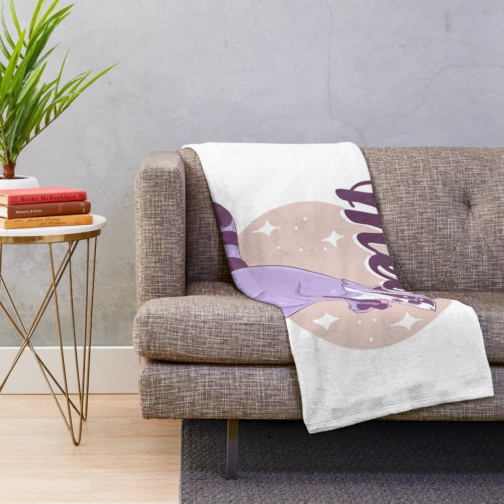 Cute plush blanket featuring a cartoon raccoon character