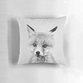 A black and white portrait illustration of a cute baby fox on a decorative throw pillow