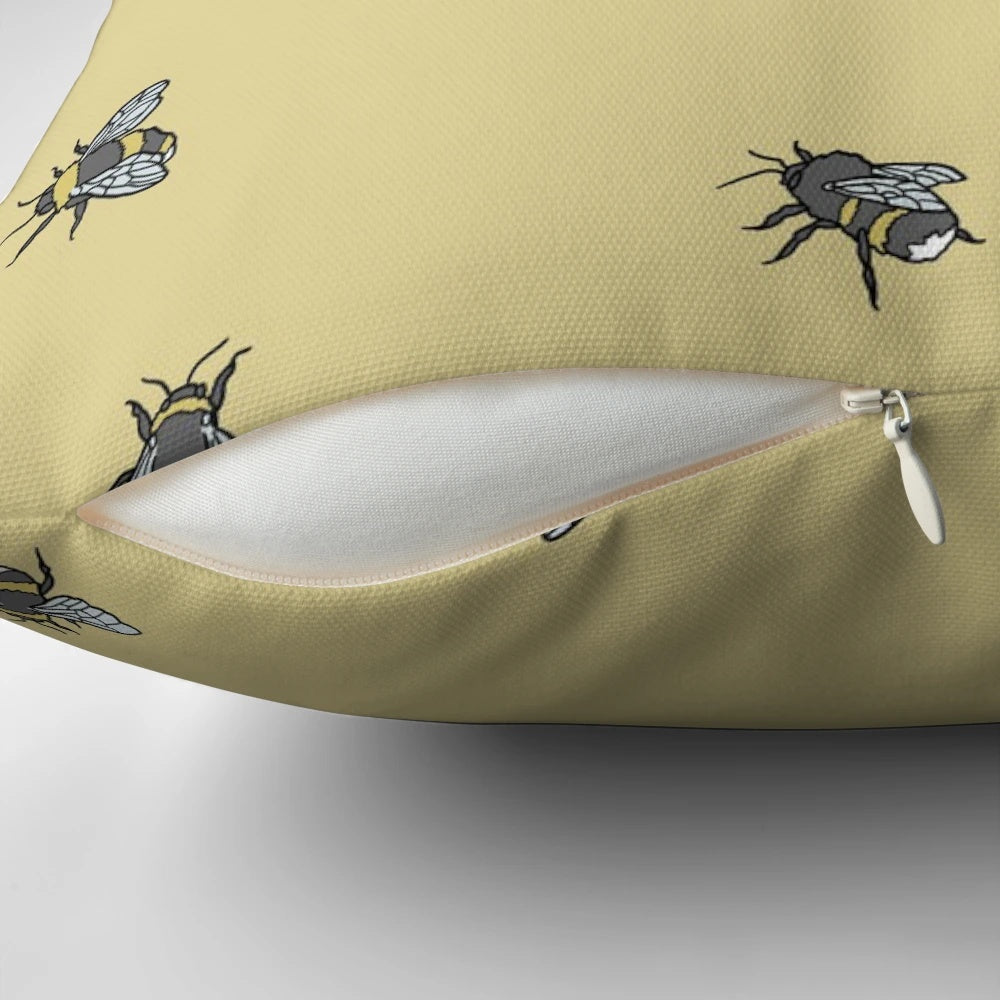 Decorative throw pillow with a vibrant bee and honeycomb pattern design