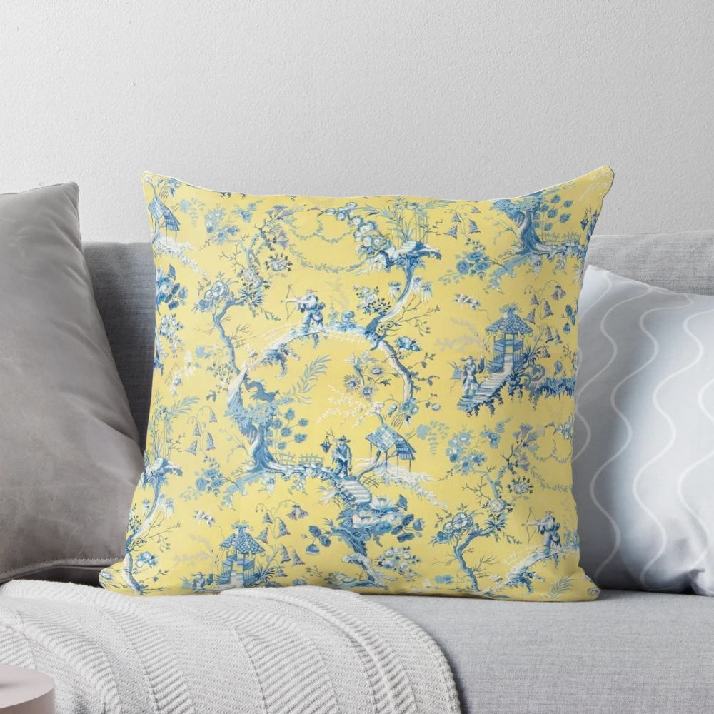 Blue and yellow toile pattern decorative throw pillow with scenic village and tree design